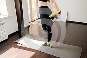 Woman doing stretching exercise warming up muscles