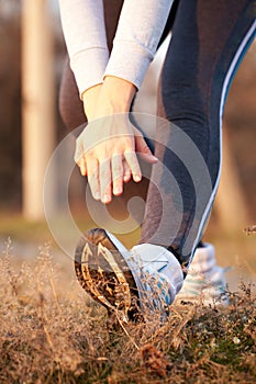 Woman doing stretching exercises. Healthy lifestyle concept.