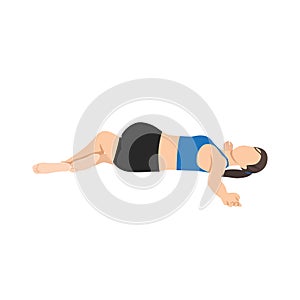 Woman doing Supta Matsyendrasana yoga pose, Reclined Spinal Twist pose