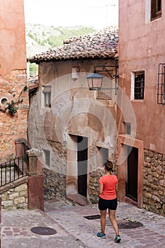 Woman doing tourism in AlbarracÃ­n, medieval town in Spain