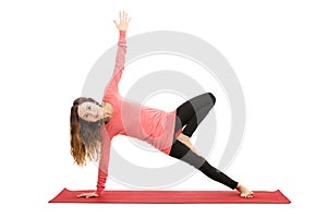 Woman doing tree pose variation