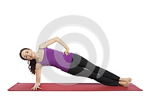 Woman doing a variation of side plank pose