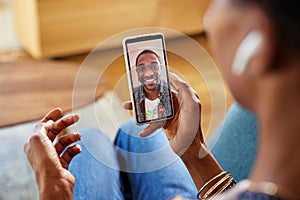 Woman doing video call with her husband at home