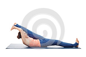 Woman doing Yoga asana Supta padangusthasana isolated