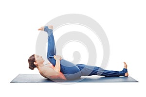 Woman doing Yoga asana Supta padangusthasana isolated