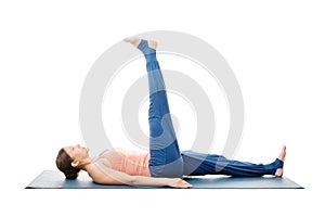 Woman doing yoga asana Uttanpadasana photo