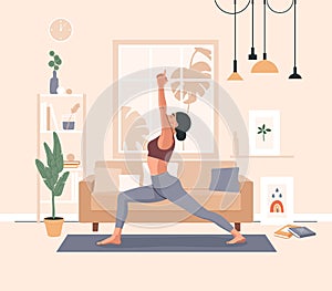 Woman doing yoga exercises, practicing meditation and stretching on the mat. Girl character in yoga studio or home interior.