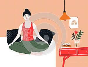 Woman doing yoga and meditation in bed. Mindfulness practice in lotus pose at home. Cozy room interior with pillows