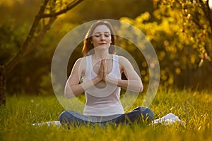 Woman doing yoga outdoors