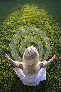 Woman doing yoga outside