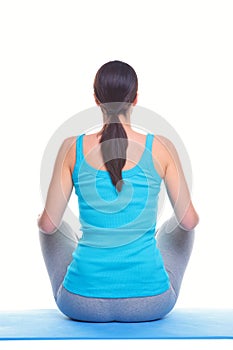 Woman doing yoga rear view