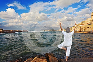 The woman doing yoga on Sunset