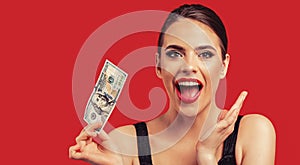 Woman with dollars in hand. Portrait woman holding money banknotes. Girl holding cash money in dollar banknotes. Woman