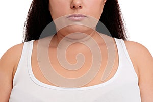 Woman with double chin on white background