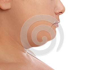Woman with double chin on white background