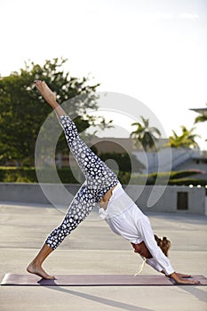 Woman in a downward stretch