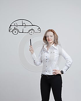 Woman drawing car, concept on the subject of