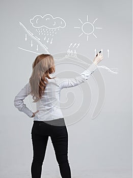 Woman drawing schematic representation of the