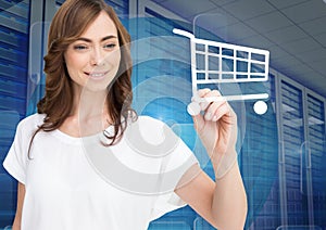 Woman drawing shopping cart sign on screen against server room in background