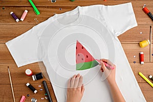 Woman drawing watermelon slice