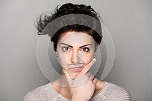 Woman with Drawn Mustaches photo