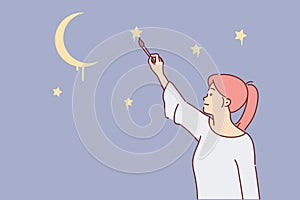 Woman draws stars in night sky, dreaming visiting space or seeing clear evening firmament above head