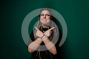 Woman With Dreadlocks Making a Peace Sign