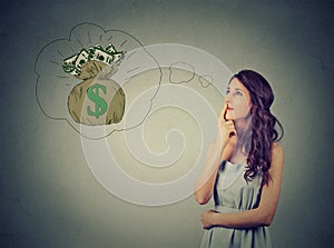 Woman dreaming of financial success