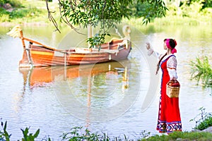 Woman in dress suit stylized Ukrainian folk