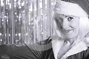 Woman dressed as Santa Claus photo