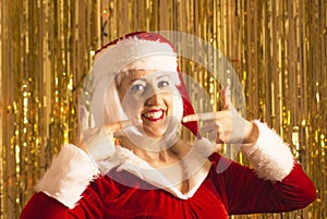 Woman dressed as Santa Claus photo