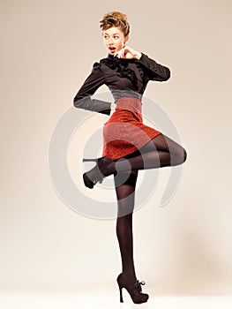 woman dressed elegant doing a fashion shoot