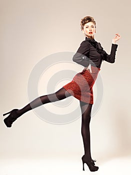 woman dressed elegant doing a fashion shoot