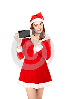Woman dressed red santa`s costume holing tablet pc