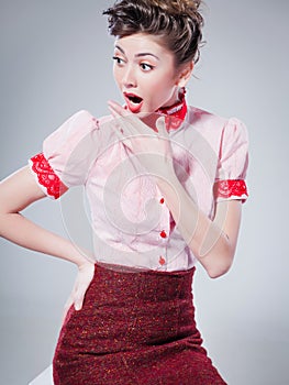 woman dressed retro doing a pin-up fashion shoot