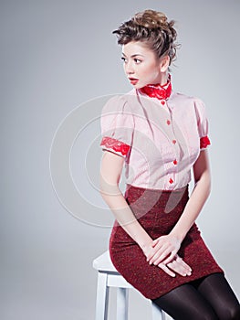 woman dressed retro doing a pin-up fashion shoot