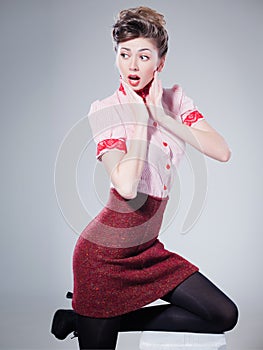woman dressed retro doing a pin-up fashion shoot