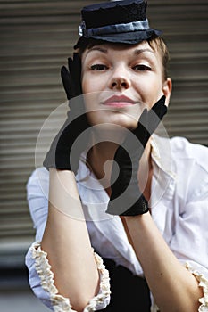 Woman dressed up in retro style posing