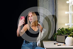 Woman at dressing room mirror
