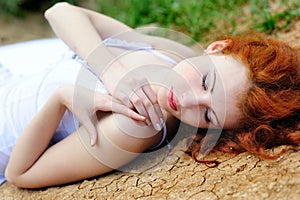 Woman on the dried up ground