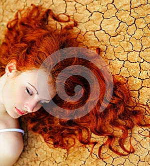 Woman on the dried up ground