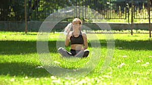 Woman drink water after sport