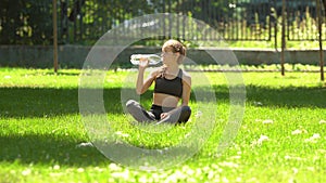 Woman drink water after sport