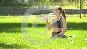 Woman drink water after sport