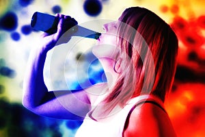 Woman drinking from a bottle with a lively background to describe her feeling in drinking that drink.