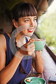 Woman drinking coffee