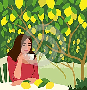 Woman drinking coffee in the garden in the shade of lemon trees