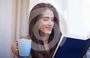 Woman, drinking coffee and reading book to relax at home, literature and fiction novel for knowledge. Female person