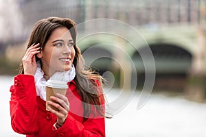 Woman Drinking Coffee by Westminster Bridge, London, England