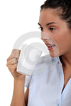 Woman drinking a cup of tea